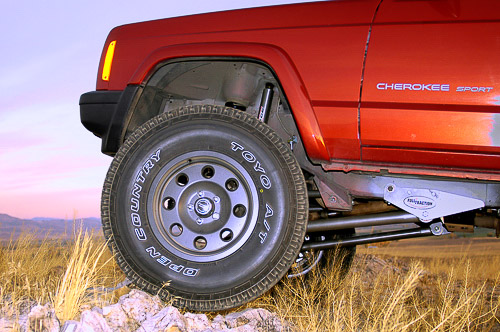 Profile of lifted XJ Cherokee reveals substantial ground clearance.