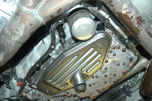 Typical Jeep transmission filters use a retaining screw; 45RFE also uses a spin-on type.