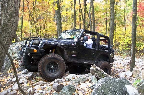 Al Handy and the black TJ Wrangler Rubicon in the woods!