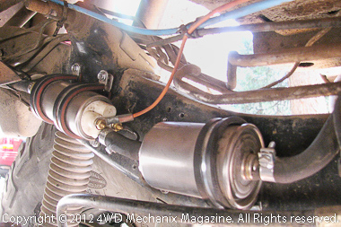 Fuel pump and fuel filter in tandem along frame rail