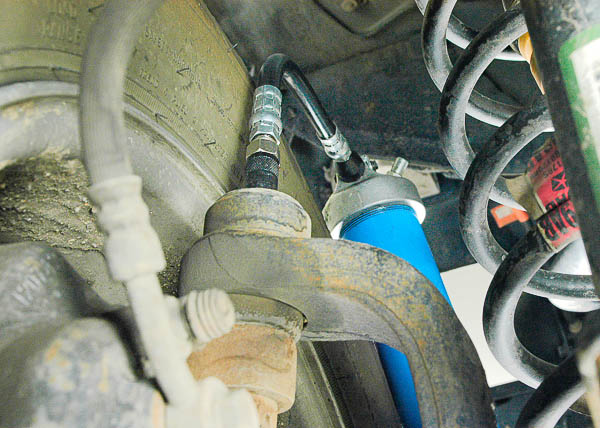 Right upper ball joint at steering knuckle.