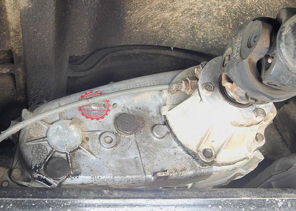 The typical, modern Jeep 4WD transfer case oil access.