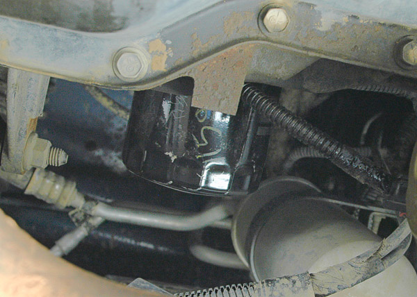 Awkward oil filter access is not uncommon on 4WDs.