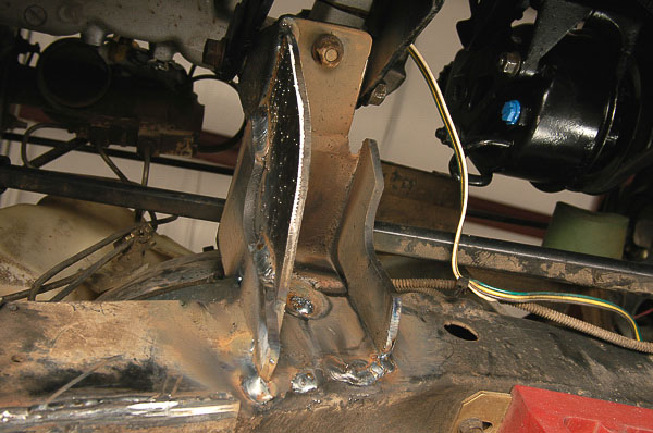 The other Jeep engine bracket installed at right frame rail.