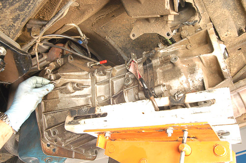 Proper use of transmission jack in Jeep transmission removal.