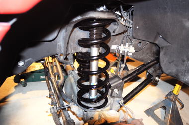 Mopar Suspension Lift includes new link arms and bushings, longer coil springs, drop brackets and a new pitman arm.