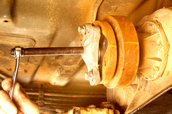 Using puller to remove driveline damper.