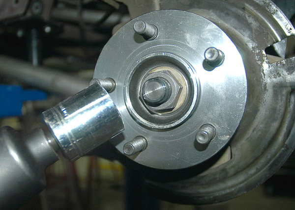 Axle shaft nut tightening