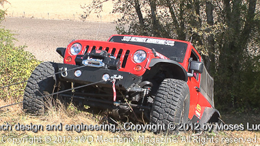 Jeep JK Wrangler pulling itself with the new Zeon winch!