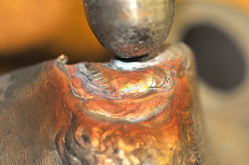 TIG weld of iron with peening after each pass.